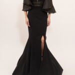 Vestido negro de sirena con olanes de mangas a espalda