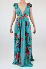 Vestido azul de estampado floral con abertura en costados, olanes en hombros y escote en espalda
